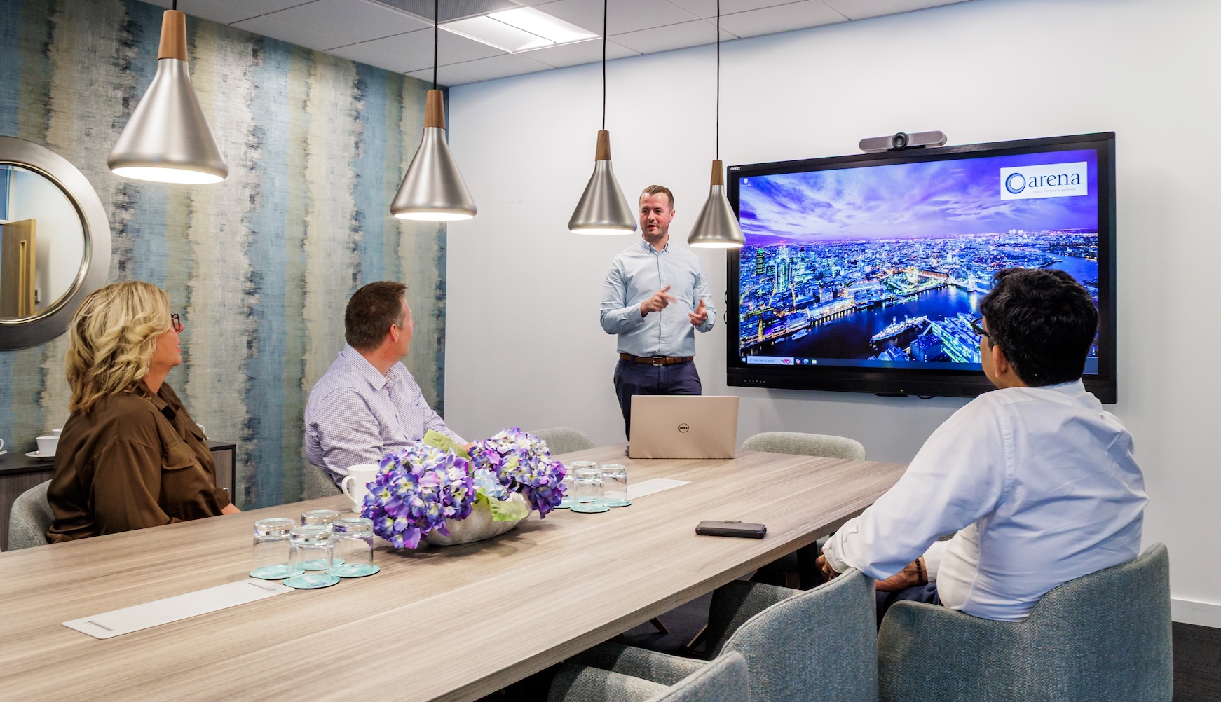 People meeting in a workspace at Riverside serviced offices in Camberley by Arena Offices