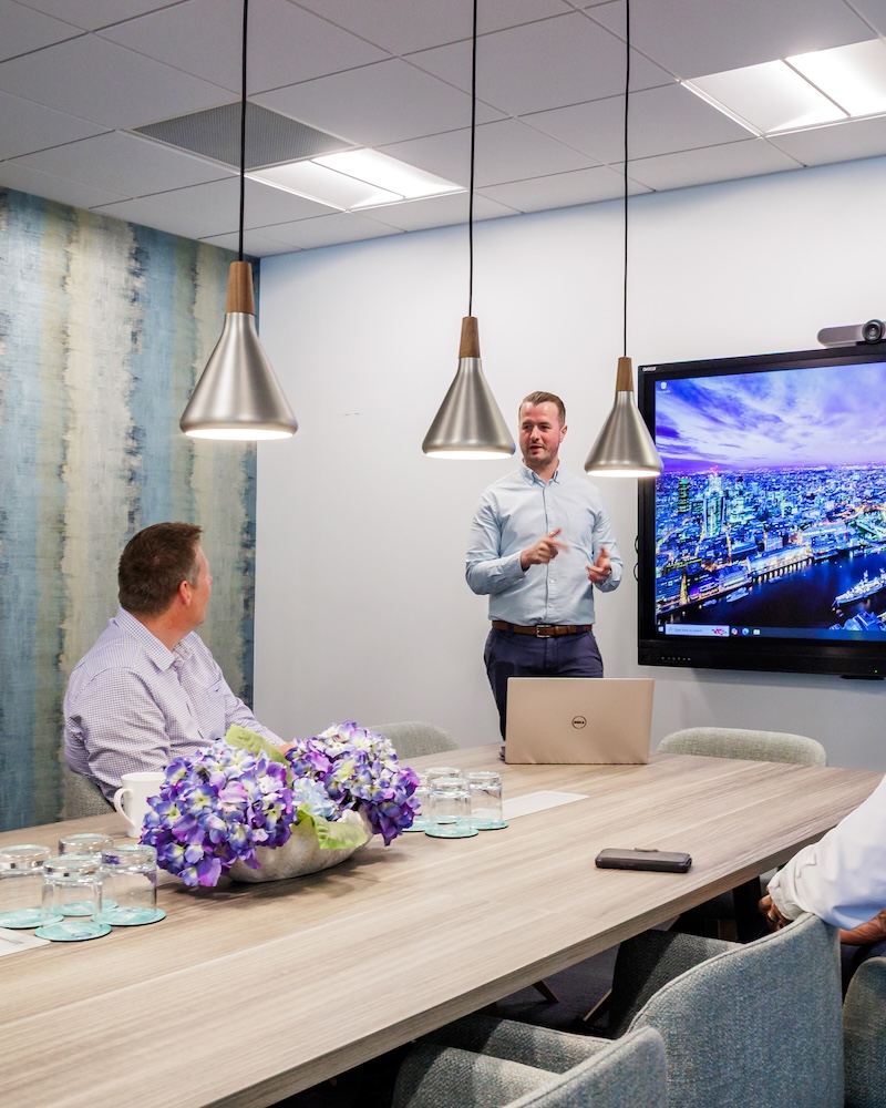People meeting in a workspace at Riverside serviced offices in Camberley by Arena Offices